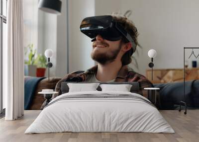 resting on the comfortable sofa wearing VR headset glasses Wall mural