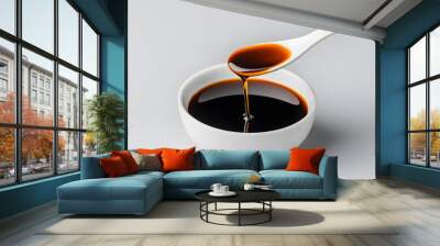 Soy Sauce in Bowl with Spoon | Classic Asian Condiment for Culinary Flavoring Wall mural