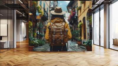 Young woman tourist wearing hat and backpack Wall mural