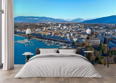 Aerial view of Leman lake and Geneva city in Switzerland. The second-most populous Swiss city also one of the world's major centers of international diplomacy. Beautiful drone POV of European place Wall mural