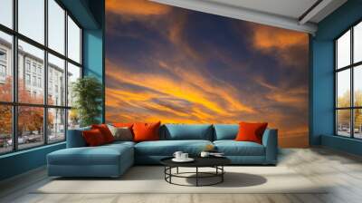 Enjoy a panoramic view of the skyline. The sun rises in the morning sky with colorful clouds. and beautiful cloud patterns In the soft light of the morning	 Wall mural