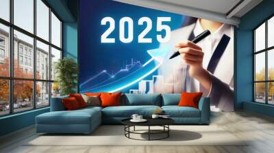 Businesswoman draws a rising arrow graph of the company in the future to 2025. Planning opportunities, challenges and new business strategies, goals, plans and vision for 2025. Wall mural