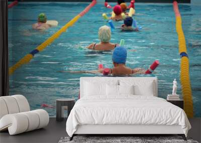 group of older women doing water aerobics in the pool Wall mural