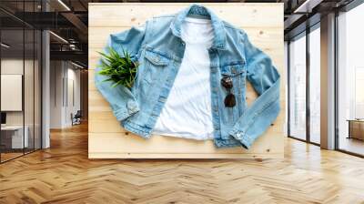 flat lay, White tshirt mockup and denim jacket jeans on brown wooden background. Template, Wall mural