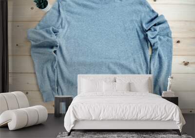 Gray male long sleeved shirt mock up flat lay on wooden background. Top front view Wall mural