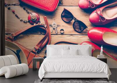 clothing for women, placed on a wooden floor. Wall mural