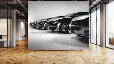 Black sedan cars standing in a row. Wall mural