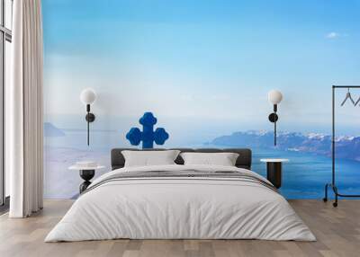 Blue cross on the church roof in Fira on Santorini island, Greece. Aegean sea. view Wall mural