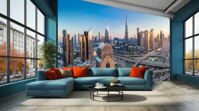 Burj Khalifa in Dubai downtown skyscrapers highrise architecture at sunset Wall mural