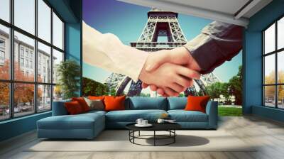 business in paris, france. handshake on eiffel tower background Wall mural