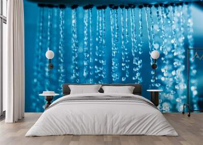 Clear water flowing from shower. Wall mural