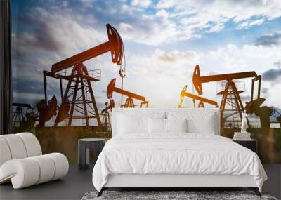 Oil pump jack work on oilfield petroleum extraction Wall mural