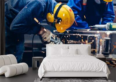 worker grinding in a workshop. heavy industry factory Wall mural