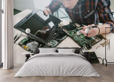 Computer engineer fixing disassembled laptop. Science technology electronics design development Wall mural