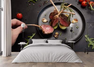 tasting delicious gourmet rack of lamb recipe concept. meat restaurant meal. luxury lifestyle. Wall mural