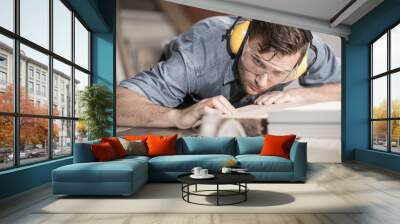 carpenter at work with wood Wall mural