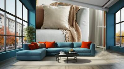 Close-up of gray comfortable sofa in modern apartment - panorama Wall mural