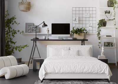 Desktop computer mock-up on an industrial desk in a scandinavian student bedroom interior workspace with white walls Wall mural