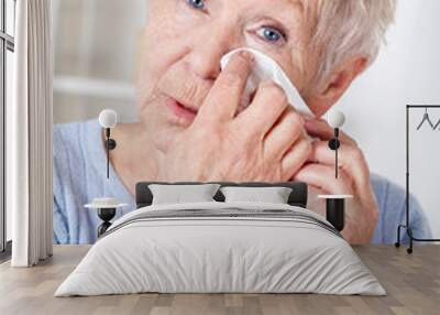 Elderly woman crying Wall mural