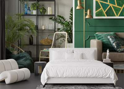 Emerald green interior with grey accents, urban jungle and fancy furniture Wall mural