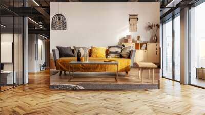 Fashionable living room interior with yellow and grey design and long coffee table in the middle Wall mural