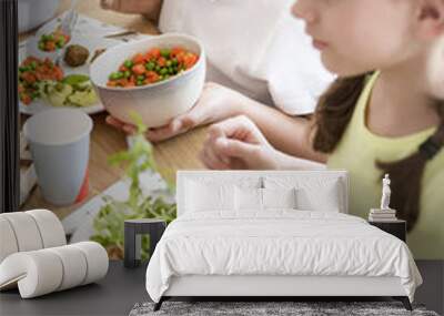 High angle of children eating vegetables for dinner at school Wall mural