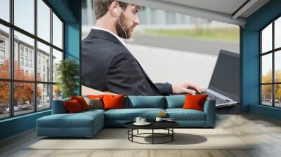 Man sitting on bench Wall mural