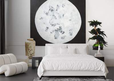 Moon poster next to bonsai in white interior in japanese style with pillows on the floor. Real photo Wall mural