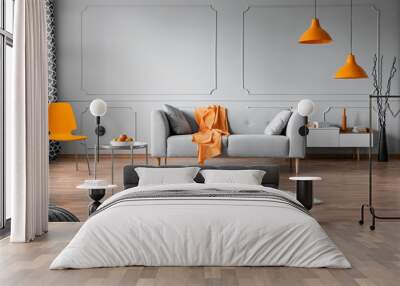 Orange accents in grey living room interior with copy space on empty wall Wall mural