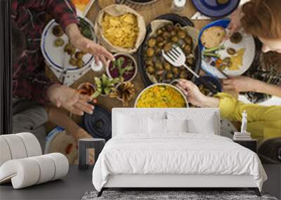 People sharing food at table Wall mural