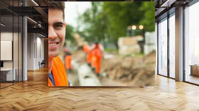 Smiling because of the job Wall mural