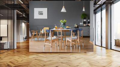 Table in grey room interior Wall mural