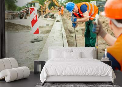 tired road construction worker Wall mural