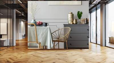 Vertical view of dining room interior with small table and golden chairs Wall mural