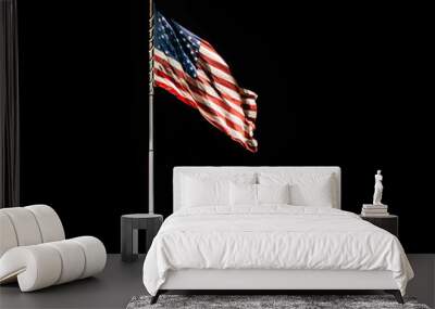 Pole with waving Old Glory American flag isolated on black, copy space Wall mural