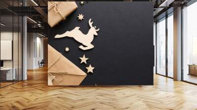 Christmas banner. Handmade wooden decoration on black background Wall mural