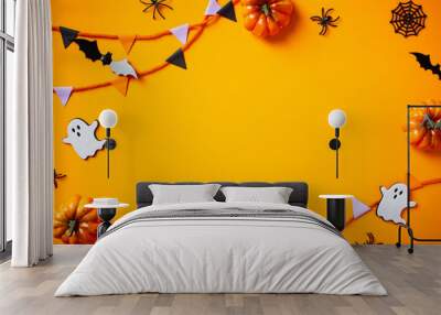 Halloween flat lay composition with pumpkins, spiders, ghosts, bunting flag garland on orange background. Happy Halloween banner mockup. Wall mural