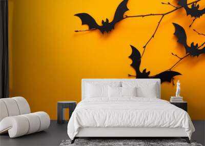 Halloween holiday concept. Halloween bats on orange background. Halloween party greeting card mockup with copy space. Flat lay, top view, overhead. Wall mural