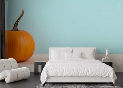 Orange pumpkin on blue background. Happy Thanksgiving or Halloween holiday banner template. Wall mural