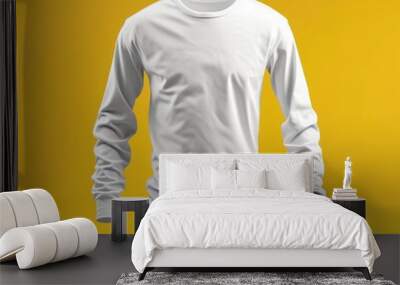 White long sleeve t-shirt isolated on a yellow background. Mockup blank sportswear front view. Wall mural