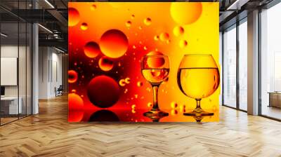 clear glass with water and oily drops on bright background Wall mural