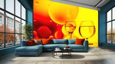 clear glass with water and oily drops on bright background Wall mural