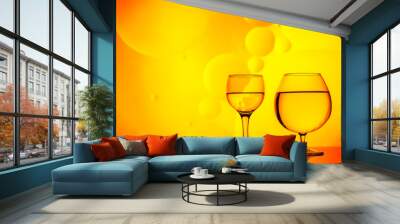 clear glass with water and oily drops on bright background Wall mural