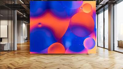 oily drops in water with colorful background, close-up  Wall mural