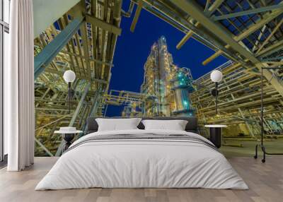 view of metal pipes of industrial plant outdoor at night  Wall mural