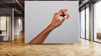 Crop black woman reaching out Wall mural