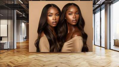 Two beautiful black women with long black hair, natural skin tones and radiant skin, beauty model Wall mural