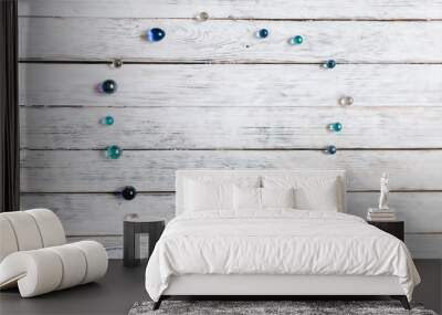 glass balls on a white vintage Wood Texture Background. MOCK-UP  Wall mural