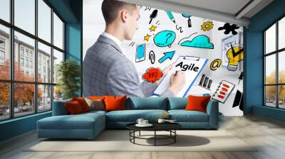 Business, technology, internet and network concept. Young businessman thinks over the steps for successful growth: Agile Wall mural