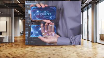 Business, Technology, Internet and network concept. Young businessman working on a virtual screen of the future and sees the inscription: Human resources Wall mural